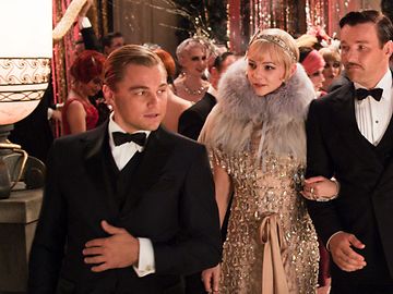  Baz Luhrman's "The Great Gatsby" movie scene: Gatsby leads his guests through the party hall