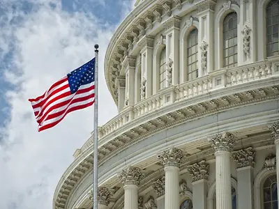 US Capitol with US flag