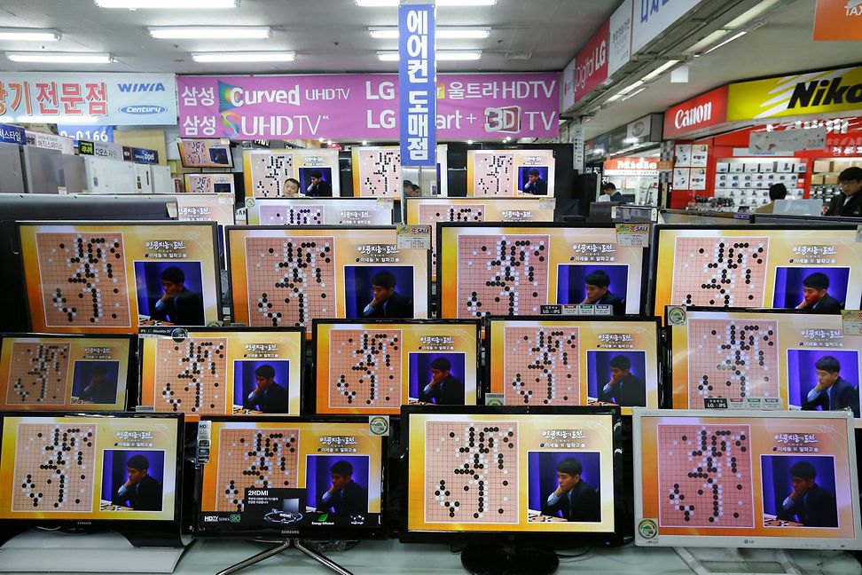TV screens in the window of a store in Seoul, Korea