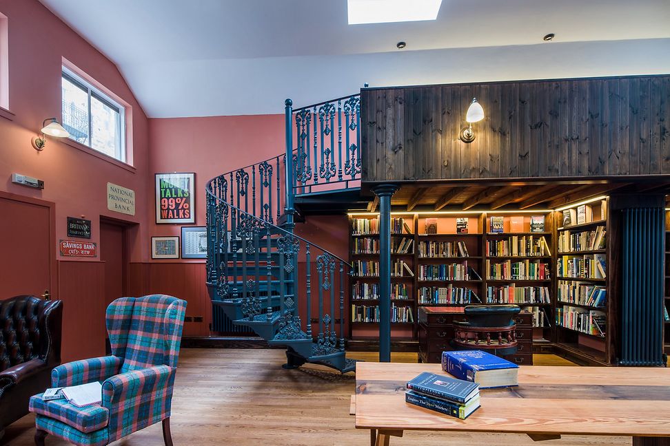 Staircase and bookshelves in the Library of Mistakes