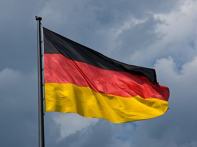 German flag with clouds