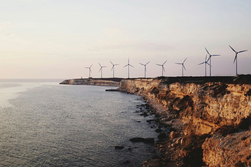 Photo of wind turbines at the coast