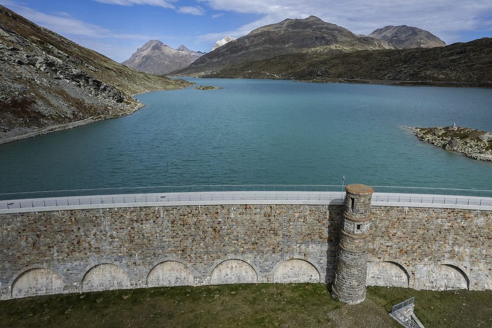 View of the dam wall at Lago Bianco on the Berninapas